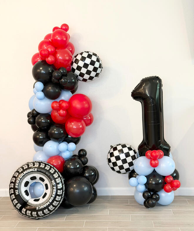 Custom balloon garland setup by Bloom and Joy Co.